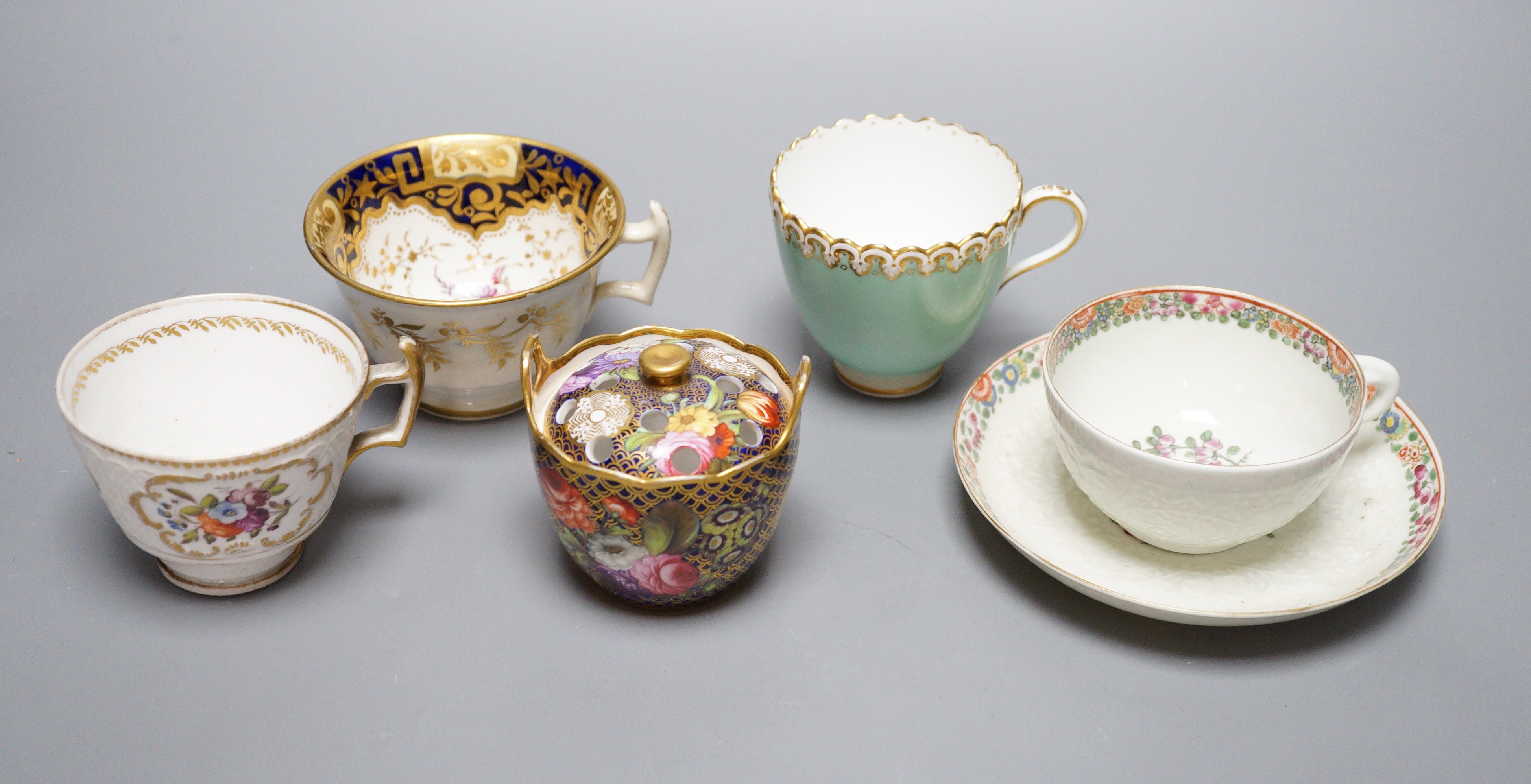 A small bone china pot pourri, possibly Spode, a relief moulded teacup and saucer, and three cups